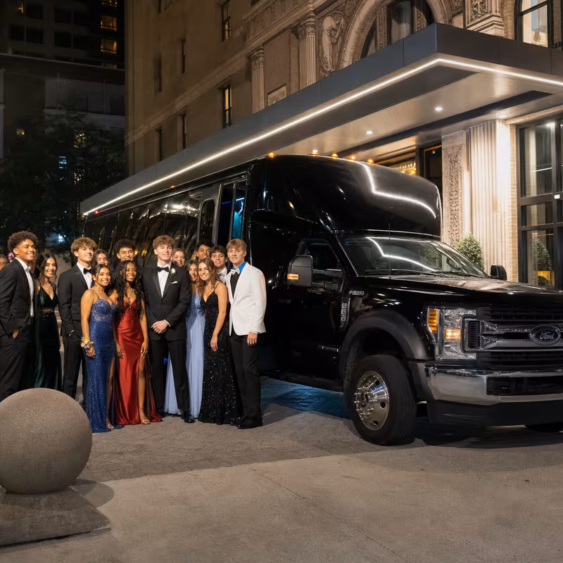Party bus interior with wraparound leather seating and LED lighting in Jersey City
