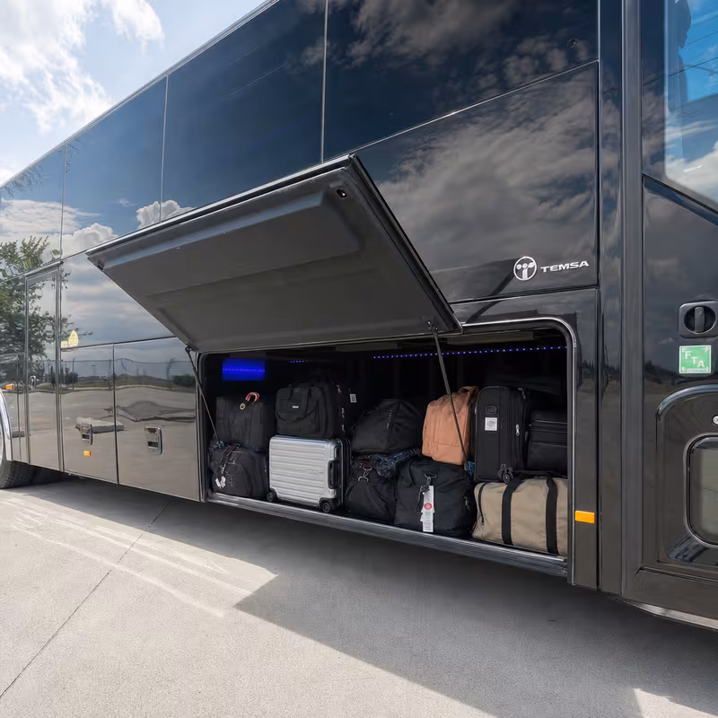Party bus interior with wraparound leather seating and LED lighting in Jersey City